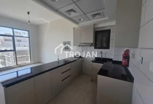 Modern kitchen in a brand new 1 bedroom apartment in Bliss Homes Dubai Land