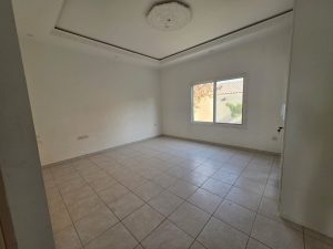 Spacious bedroom with high ceiling and natural light in a villa in Jumeirah 3 Dubai