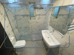 Modern bathroom in a 5 bedroom villa for rent in Al Barsha featuring walk-in shower and contemporary finishes