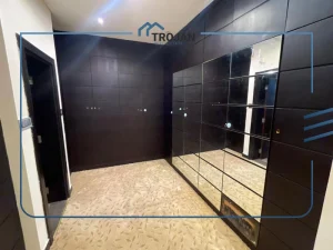 Walk-in closet and dressing room in a 5 bedroom villa for rent in Al Barsha Dubai