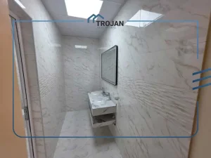Modern guest bathroom with marble finishes in stand-alone 5 bedroom villa for rent in Al Quoz 2 Dubai